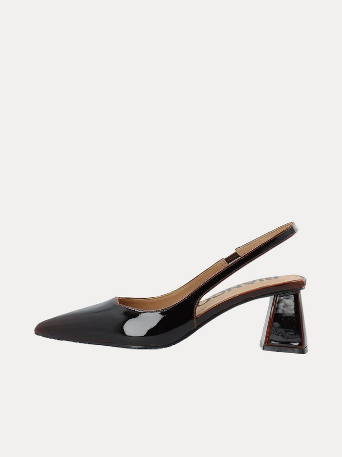A single black patent leather slingback pump with a pointed toe and a unique geometric block heel, shown in profile against a white background.
