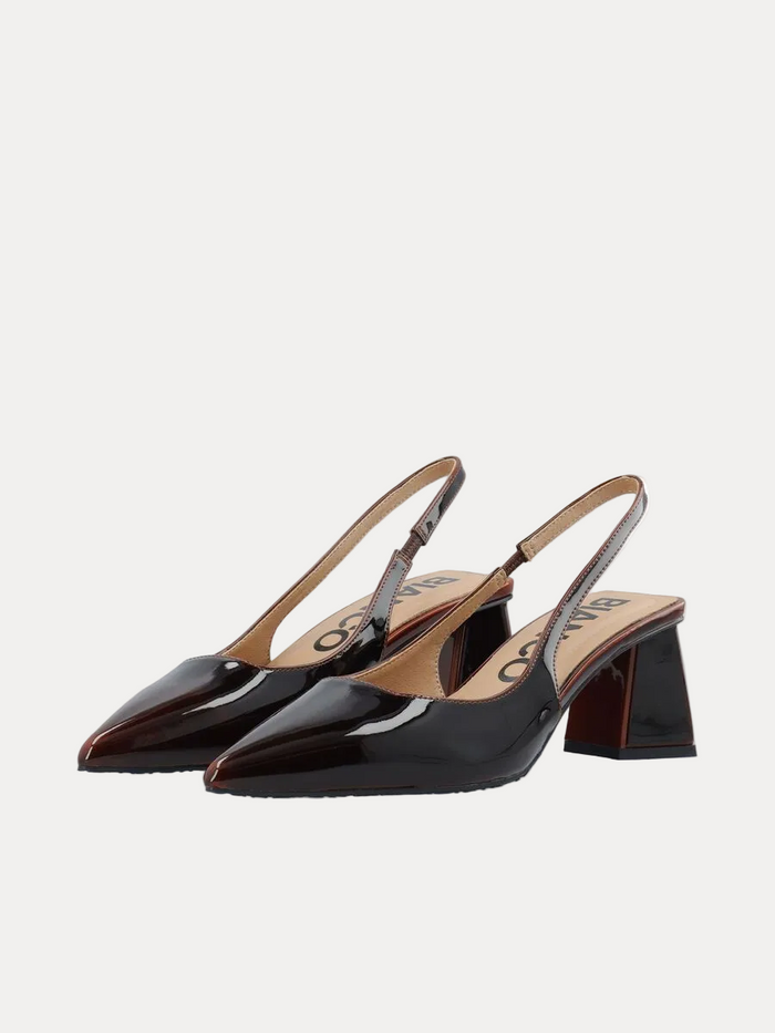 Black leather loafer shoe on a white background