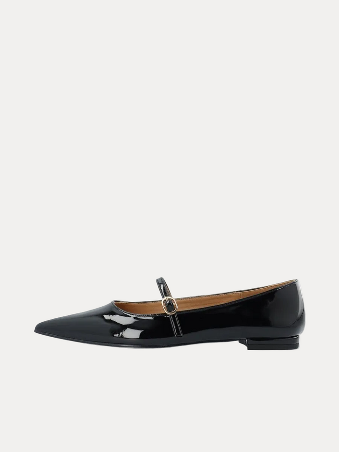 A single black patent leather Mary Jane flat shoe with a pointed toe and a small silver buckle, shown in profile against a plain white background.