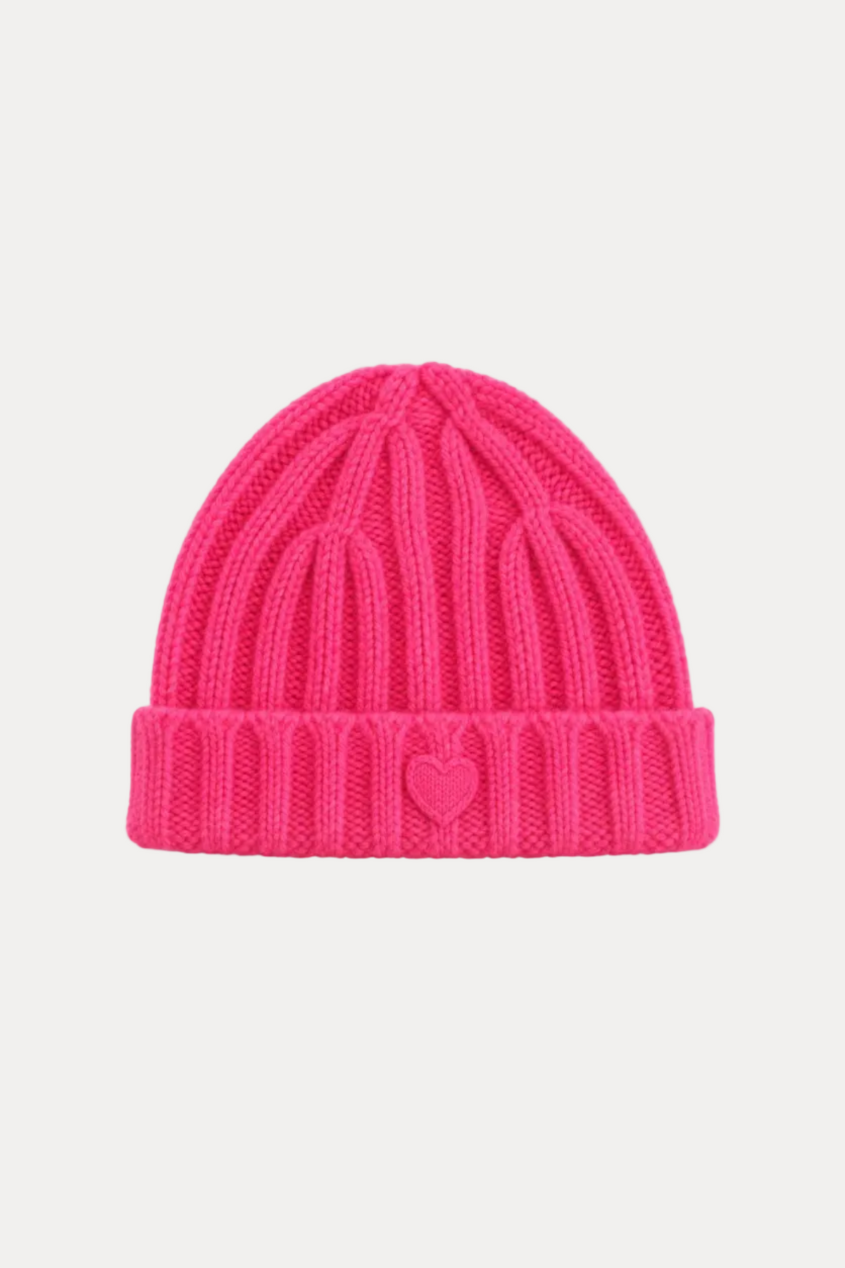 A bright pink ribbed knit beanie hat with a small matching pink heart detail on the front of the folded cuff, shown against a plain white background.