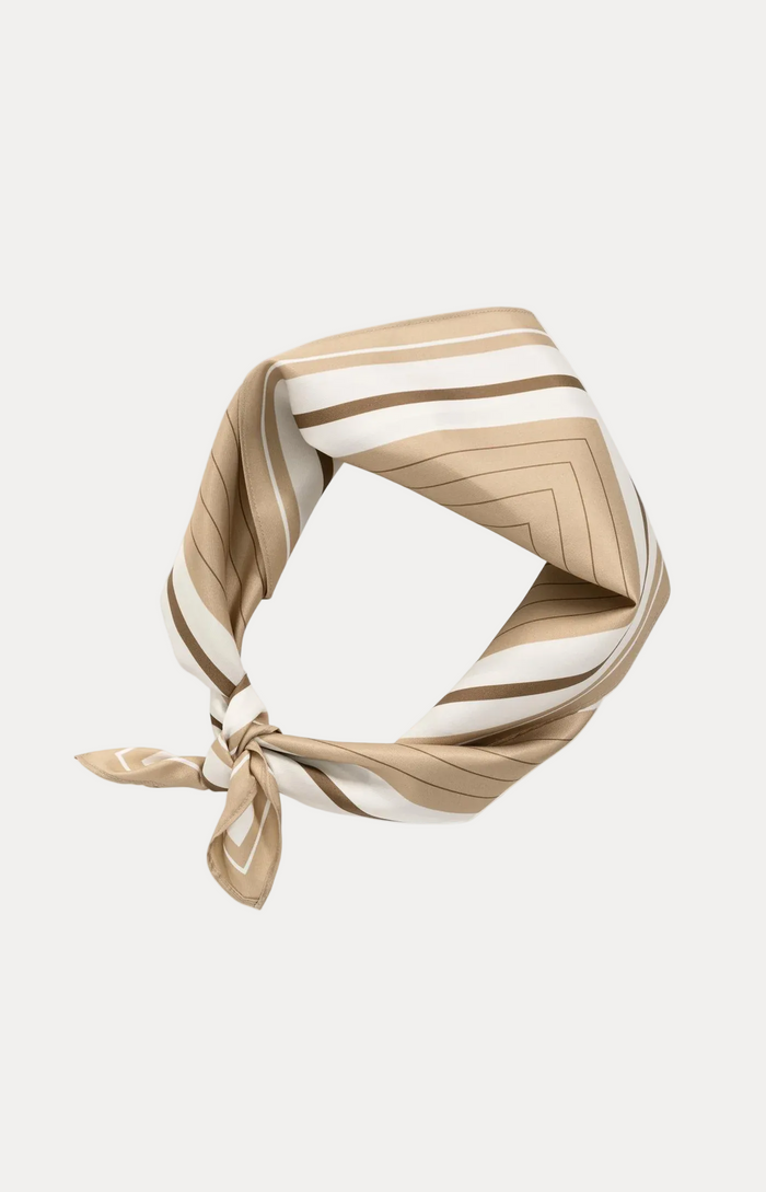 A beige and white striped silk scarf tied in a knot, displayed on a clean white background.